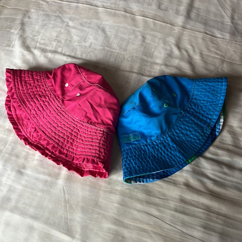 UV Skinz kids fuchsia and blue bucket hats in size 6 and 7